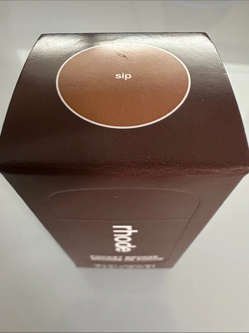 RHODE Pocket Bronze Compact - Deep Brown Packaging